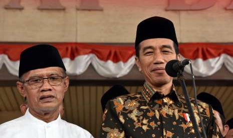 Presiden Joko Widodo (Jokowi) bersama Ketua Umum PP Muhammadiyah Haedar Nashir.