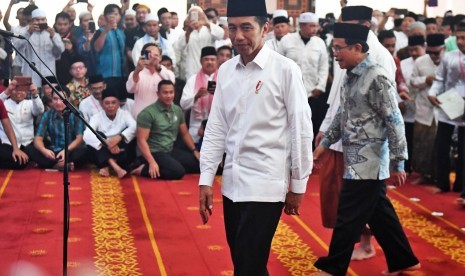 President Joko Widodo (left)