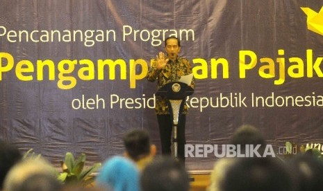 Presiden Joko Widodo memberikan sambutannya saat Pencanangan Pengampunan Pajak di kantor Direktorat Jenderal Pajak Kementerian Keuangan, Jakarta, Jumat (1/7).(Republika/Agung Supriyanto)