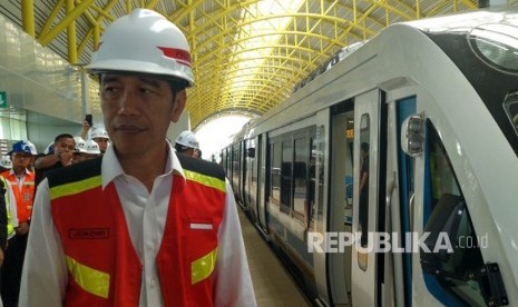 President Joko Widodo observes light rail transit (LRT) Palembang, South Sumatra, Friday (July 13).