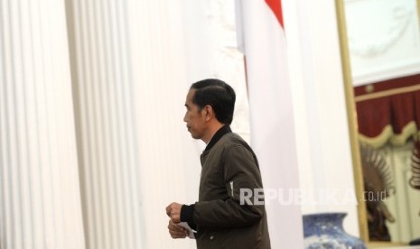 Presiden Joko Widodo usai menggelar konferensi pers terkait Aksi Damai 4 November di Istana Merdeka, Sabtu (5/11).