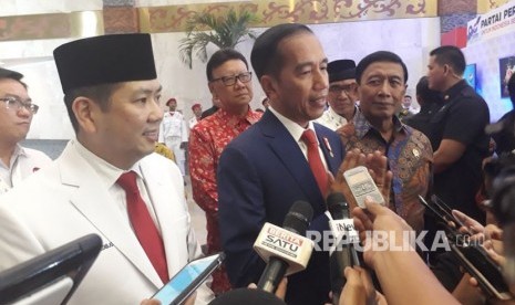 Presiden Jokowi memberikan keterangan pers usai menghadiri Rapimnas II Partai Perindo, Rabu (21/3).