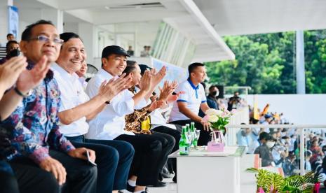 Presiden Jokowi saat hadir dalam final Energen Champion SAC Indonesia National Championship di Stadion Madya, Jumat (13/1) sore. 