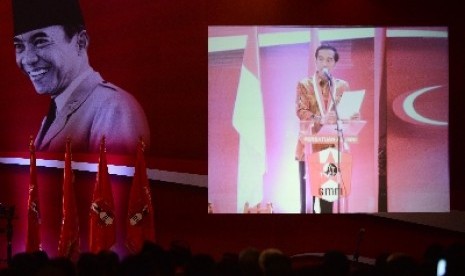 Presiden Jokowi saat memberikan sambut di Kongres III Persatuan Alumni GMNI di Jakarta International Expo, Jumat (7/8).