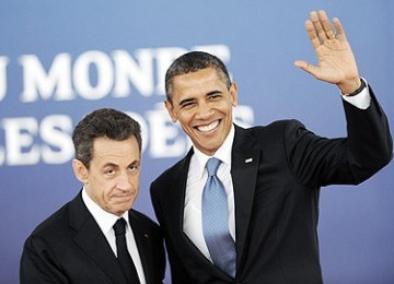 Presiden Prancis Nicolas Sarkozy dan Presiden AS Barack Obama di forum G20, dua pekan lalu.