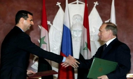 Presiden Suriah Bashar Al Assad dan Presiden Rusia Vladimir Putin