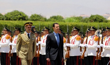 Presiden Suriah Bashar al Assad (kanan)