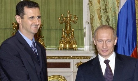 Presiden Suriah Bashar Assad dan Presiden Rusia Vladimir Putin.