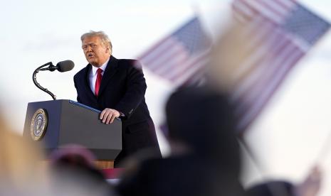 President Donald Trump speaks before boarding Air Force One at Andrews Air Force Base, Md., Wednesday, Jan. 20, 2021.