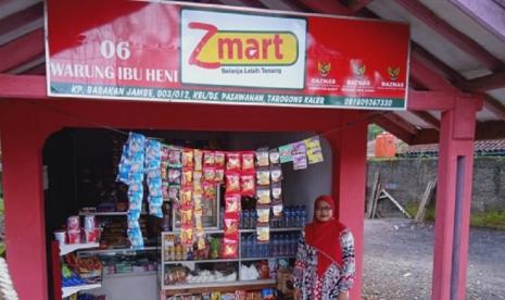  Program Zmart Baznas kembali membangkitkan semangat juang perempuan asal Garut, Heni. Dengan bantuan BAZNAS kini Heni memiliki warung yang bisa menopang hidup dirinya serta dua putra.