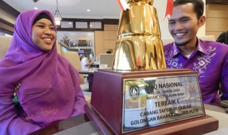 Putri Asyairah, guru rumah tahfidz juara pertama bidang tafsir bahasa inggris di MTQ XXV