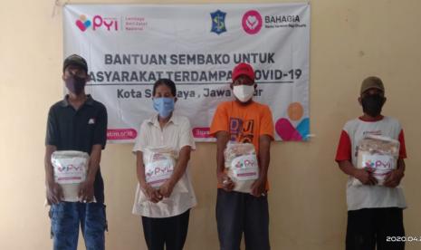  PYI Beri Bantuan di Surabaya