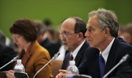 Quartet Representative Tony Blair (right) and Palestinian Finance Minister Nabil Kassis (center) and EU foreign policy chief Catherine Ashton attend a meeting of the Ad Hoc Liaison Committee, the donor support group for the Palestine, at the United Nations