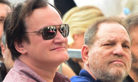 Qunentin Tarantino (kiri) dan Weinstein.