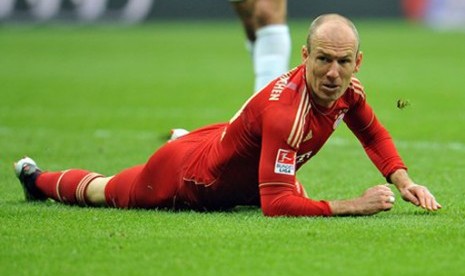  Reaksi Arjen Robben (Bayern Muenchen) saat bertanding melawan FSV Mainz 05 di Munich, Sabtu (14/4) waktu setempat. (AP Photo/Kerstin Joensson)