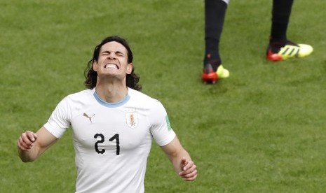 Reaksi Edison Cavani dalam satu momen di pertandingan menghadapi Mesir di ajang Piala Dunia 2018