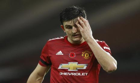 Reaksi kapten Manchester United, Harry Maguire pada laga Liga Primer Inggris lawan Arsenal di Old Trafford, Senin (2/11) dini hari WIB. United kalah 0-1.