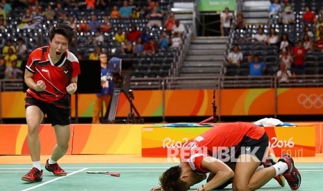 Reaksi Liliyana Natsir dan Tontowi Ahmad saat memenangkan Final ganda campuran Olimpiade Rio 2016, Rabu (17/8).