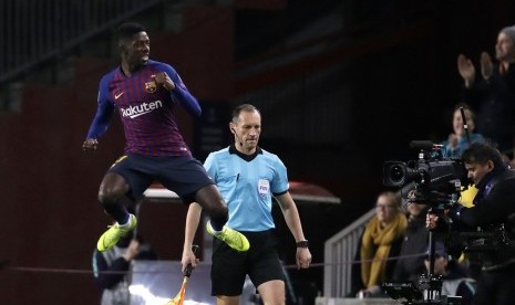 Reaksi Ousmane Dembele usai mencetak gol ke gawang Tottenham Hotspur di ajang Liga Champions 2018/2019