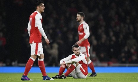 Reaksi para pemain Arsenal pada laga Liga Primer lawan Watford di stadion Emirates, Rabu (1/2) dini hari WIB. Arsenal kalah 1-2.