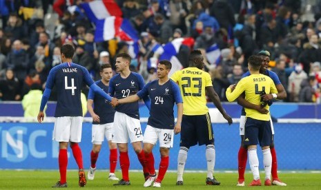 Reaksi para pemain Prancis dan Kolombia pada laga persahabatan di Stade de France, Paris, Sabtu (24/3) dini hari WIB. Prancis kalah 2-3 pada laga ini.