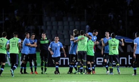 Reaksi para pemain Uruguay setelah timnya mengalahkan Venezuela di partai kualifikasi Piala Dunia zona Conmebol di Puerto Ordaz, Rabu (12/6).