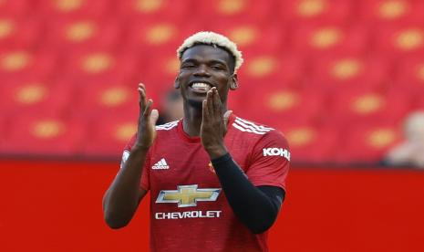 Reaksi Paul Pogba dari Manchester United saat pertandingan sepak bola Liga Utama Inggris antara Manchester United dan Fulham di Stadion Old Trafford di Manchester, Inggris, Selasa, 18 Mei 2021.