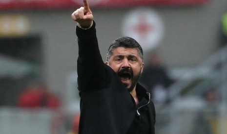 Reaksi pelatih AC Milan, Gennaro Gattuso pada laga Serie A lawan Chievo di San Siro, Ahad (18/3).