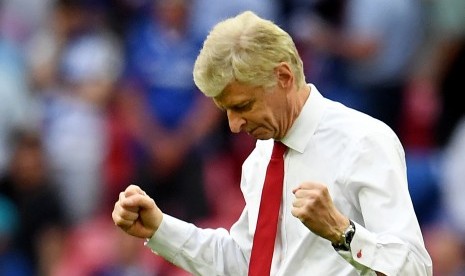 Reaksi pelatih Arsenal, Arsene Wenger setelah timnya berhasil mengalahkan Chelsea pada final Piala FA di Wembley, London, Ahad (27/5) dini hari WIB.