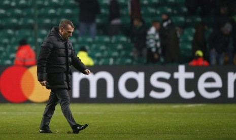 Reaksi pelatih Glasgow Celtic, Brendan Rodgers pada laga Liga Champions lawan Barcelona di Celtic Park, Kamis (24/11) dini hari WIB. Celtic kalah 0-2.