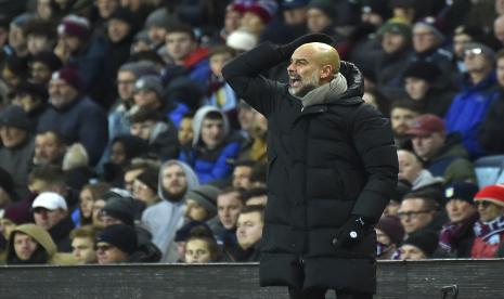 Reaksi pelatih kepala Manchester City Pep Guardiola.