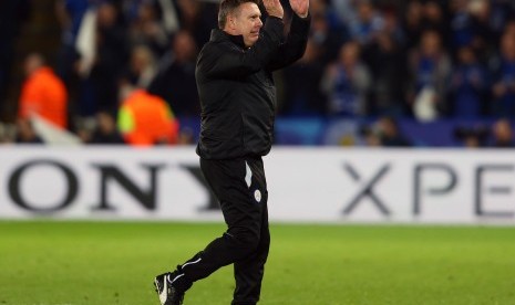 Reaksi pelatih Leicester City, Craig Shakespeare seusai laga Liga Champions lawan Sevilla di stadion King Power, Rabu (15/3) dini hari WIB. Leicester berhasil melaju ke babak perempat final.