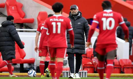 Ekspresi pelatih Liverpool Juergen Klopp usai timnya dikalahkan Fulham 0-1 di Anfield, Ahad (7/3).