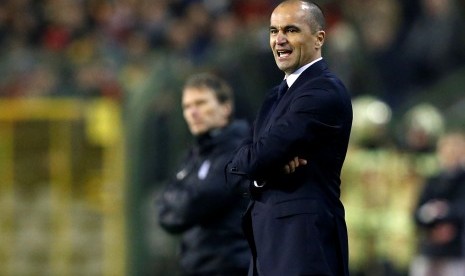 Reaksi pelatih timnas Belgia, Roberto Martinez pada laga kualifikasi Piala Dunia 2018 lawan Latvia di Brussels, Senin (14/11). Belgia menang telak, 8-1.