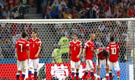 Reaksi pemain asal Rusia usai gawangnya dijebol oleh Tim Kroasia pada Perempat Final Rusia melawan Kroasia, di Sochi, Sabtu (7/7)