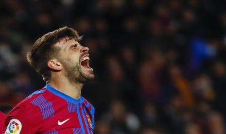 Reaksi bek veteran Barcelona Gerard Pique selama pertandingan sepak bola La Liga Spanyol. Pique mengejutkan teman-temannya ketika mengumumkan melalui media sosialnya akan pensiun pada pertengahan musim bulan November 2022. 