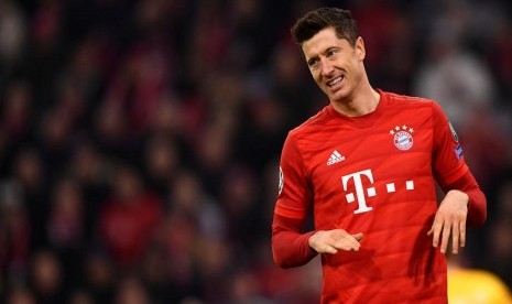 Reaksi Pemain Bayern Muenchen Robert Lewandowski dalam pertandingan melawan Olympiakos