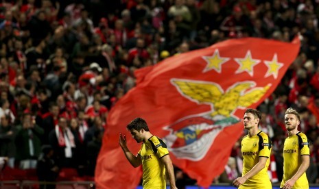 Reaksi penggawa Borussia Dortmund seusai kalah dari Benfica pada leg pertama babak perdelapan final Liga Champions di stadion Luz, Rabu (15/2) dini hari WIB. Dortmund kalah 0-1.