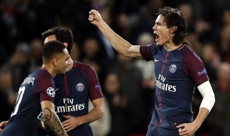 Reaksi striker PSG Edinson Cavani (kanan) usai menjebol gawang Celtic pada pertandingan Liga Champions, Kamis (23/11) dini hari WIB.