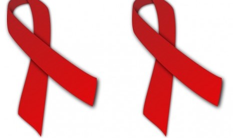 Red ribbon, the symbol for the fight against HIV/AIDS.  At least 38 people died of HIV/AIDS (acquired immunodeficiency syndrome) in Batam in the first half of the year. (illustration)  