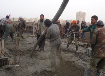 MER-C volunteers and Gazans continue the development of the third floor of Indonesian Hospital in Gaza. (file obtained by MER-C)