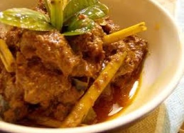 Rendang, a spicy meat dish of West Sumatra (illustration)  