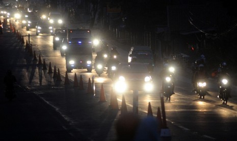 Returning travelers in Nagreg, Bandung, West Java, on Friday night.  