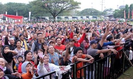 Ribuan pedagang jamu mengikuti mudik gratis yang digelar PT Sido Muncul di TMII, Jakarta Timur, Jumat (1/7).