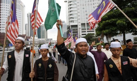 Ribuan warga Malaysia menggelar aksi damai, memprotes upaya penghinaan Islam lewat film Innocence of Muslim dan penerbitan kartun Nabi Muhammad oleh satu majalah di Prancis. 