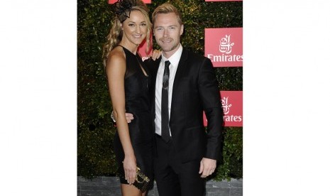 Ronan Keating dan istrinya, Storm Uechtritz. 