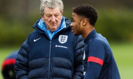 Roy Hodgson dan Raheem Sterling.