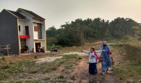 Rumah yang dijadikan contoh oleh para tersangka pada kasus perumahan syariah fiktif 