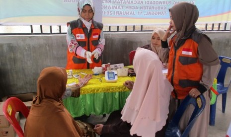 Rumah Zakat mendistribusikan 100 kaleng Superqurban kepada warga di Bali Desa Purwodadi, Kecamatan Kejuruan Muda, Kabupaen Aceh Tamiang, Aceh.