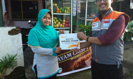 Rumah Zakat. Rumah Zakat memberi bantuan usaha.